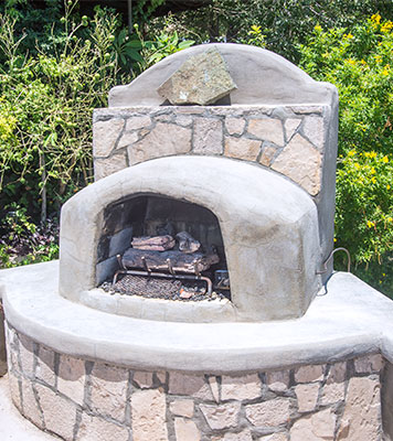 The outdoor fireplace.